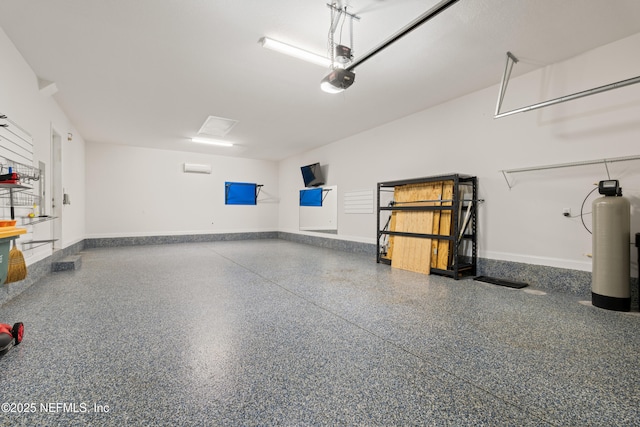 garage featuring baseboards