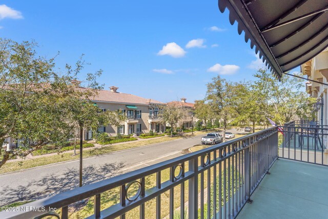 balcony featuring a residential view