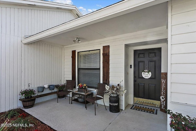 entrance to property with covered porch