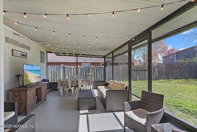 sunroom / solarium featuring plenty of natural light