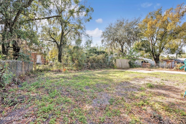 view of yard featuring fence