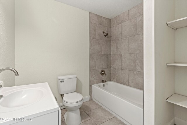 full bathroom featuring vanity, baseboards, tile patterned flooring, toilet, and shower / bathtub combination