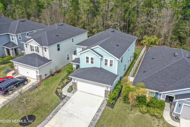 aerial view featuring a view of trees