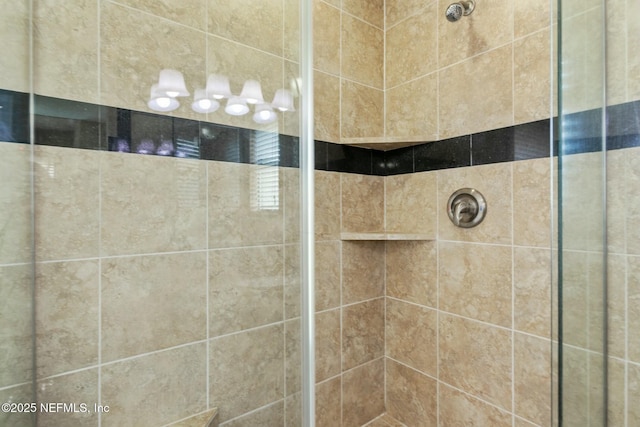 full bathroom featuring a tile shower