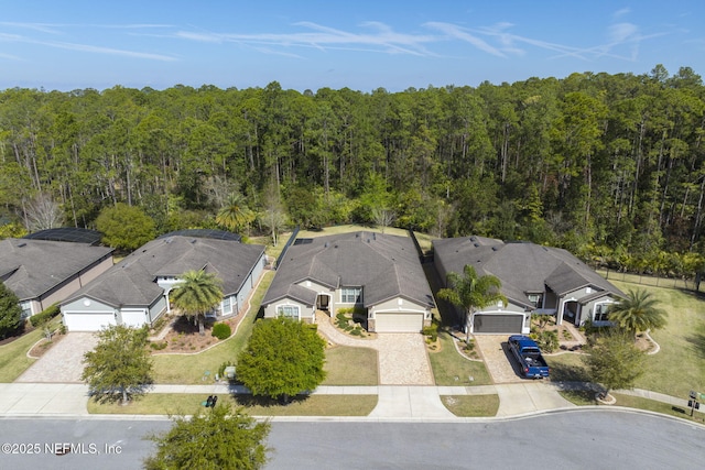 607 Caspia Ln, Ponte Vedra, FL 32081 - drone / aerial view featuring a view of trees and a residential view