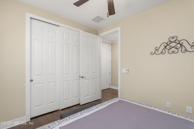 607 Caspia Ln, Ponte Vedra, FL 32081 - unfurnished bedroom featuring a closet, visible vents, baseboards, ceiling fan, and dark wood-style floors