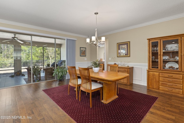 607 Caspia Ln, Ponte Vedra, FL 32081 - dining area with a wainscoted wall, ornamental molding, ceiling fan with notable chandelier, and wood finished floors
