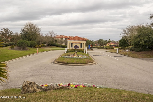 4020 Lavista Cir Unit 207, Jacksonville, FL 32217 - view of street featuring curbs and a gated entry