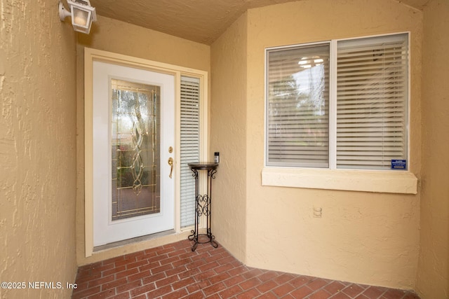 4020 Lavista Cir Unit 207, Jacksonville, FL 32217 - doorway to property with stucco siding