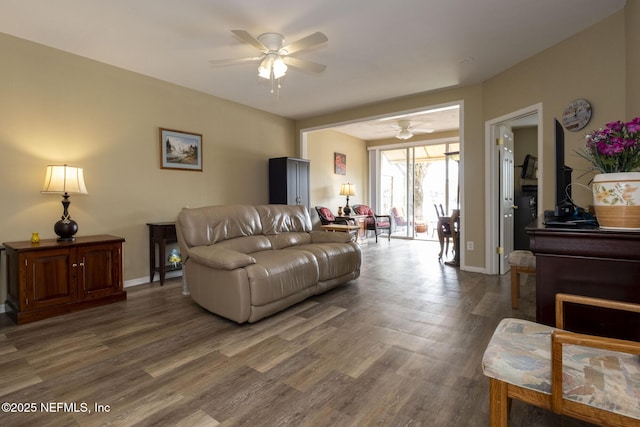 4020 Lavista Cir Unit 207, Jacksonville, FL 32217 - living area with ceiling fan, wood finished floors, and baseboards