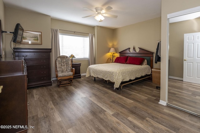 4020 Lavista Cir Unit 207, Jacksonville, FL 32217 - bedroom featuring ceiling fan, baseboards, and wood finished floors