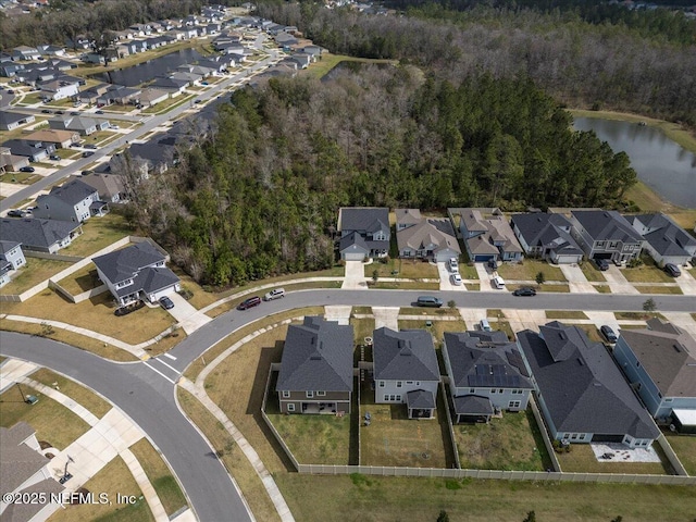 aerial view featuring a water view and a residential view