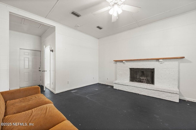 unfurnished living room with baseboards, visible vents, finished concrete floors, ceiling fan, and a brick fireplace