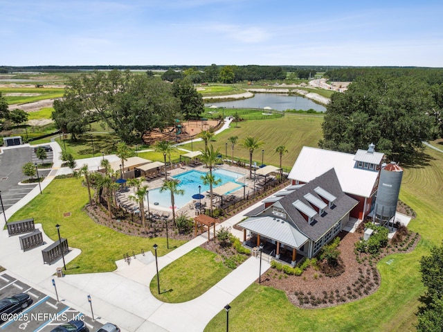 birds eye view of property featuring a water view