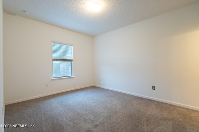 4908 Key Lime Dr Unit 301, Jacksonville, FL 32256 - carpeted empty room featuring a textured ceiling and baseboards