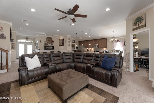 living room featuring light carpet, ornamental molding, and french doors