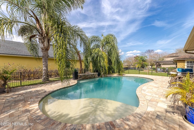 view of pool featuring a patio area, a fenced backyard, and a fenced in pool