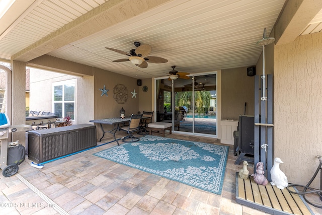 view of patio with ceiling fan