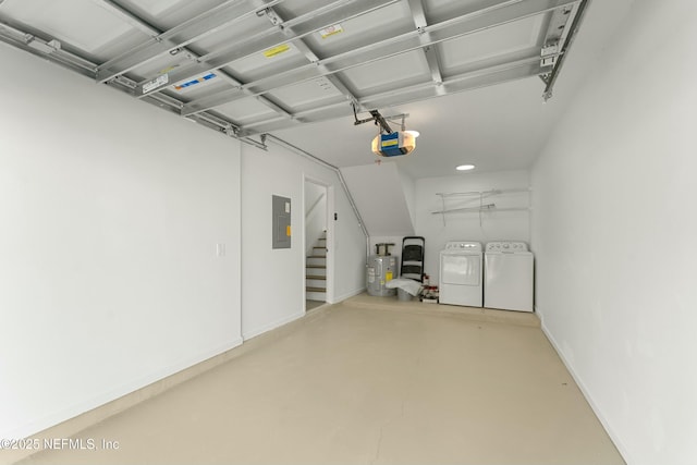 garage featuring a garage door opener, washing machine and dryer, electric water heater, electric panel, and baseboards