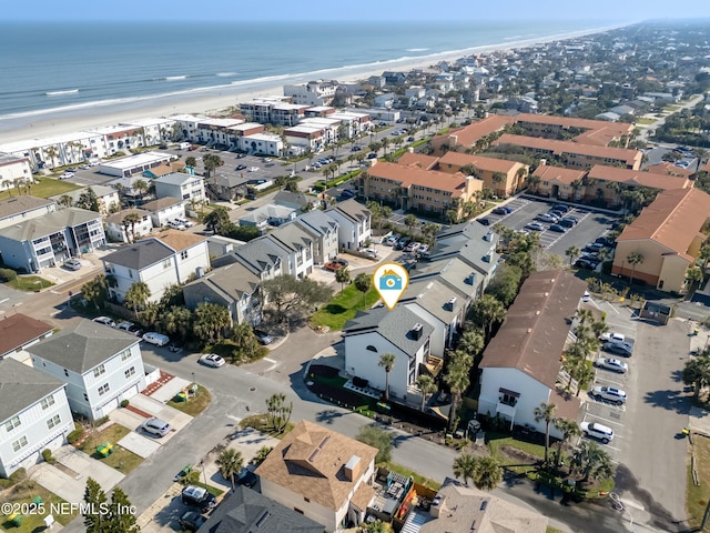 bird's eye view featuring a beach view, a residential view, and a water view