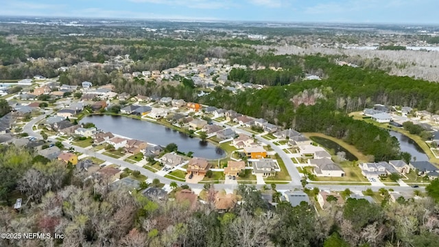 aerial view with a water view and a residential view