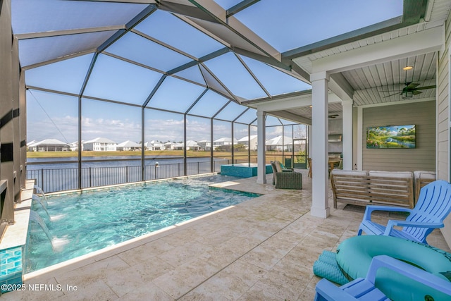 view of pool with ceiling fan, a patio, outdoor lounge area, a water view, and a fenced in pool