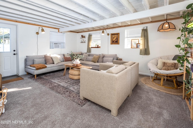 carpeted living room with plenty of natural light, cooling unit, and beam ceiling