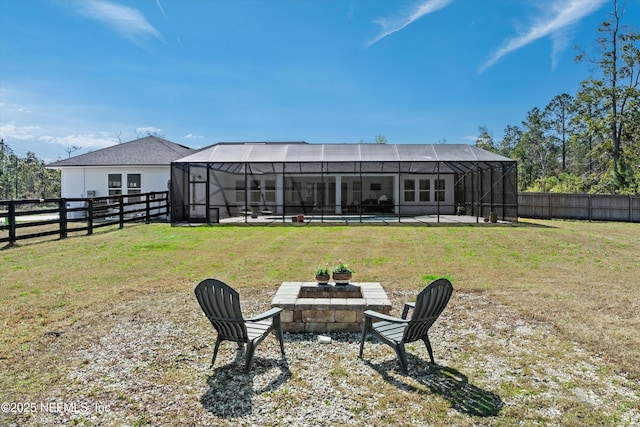 view of yard featuring a lanai and a fenced backyard