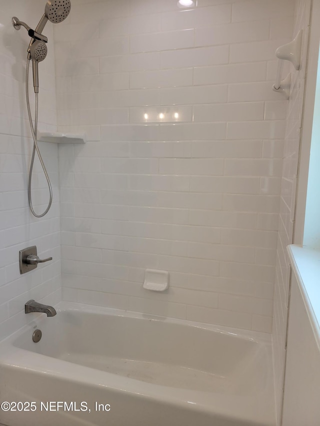 bathroom featuring tub / shower combination