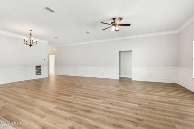 unfurnished living room featuring light wood-type flooring, visible vents, and ceiling fan with notable chandelier