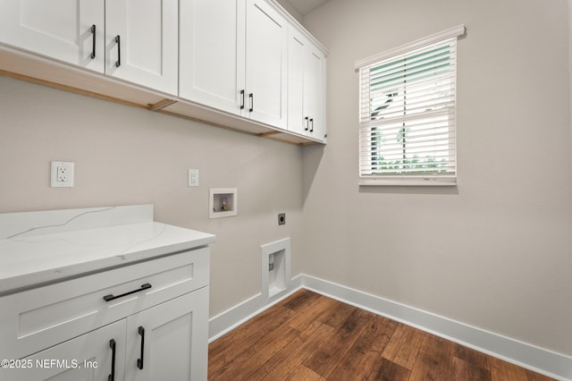 washroom featuring cabinet space, baseboards, dark wood finished floors, hookup for an electric dryer, and washer hookup