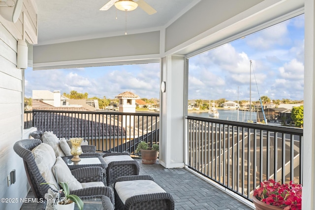 balcony featuring a ceiling fan