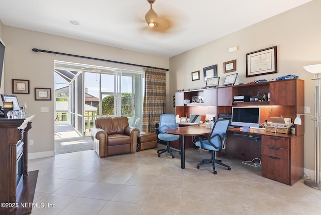 office featuring light tile patterned flooring and baseboards