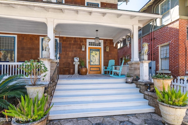 doorway to property with covered porch