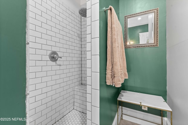 bathroom featuring tiled shower