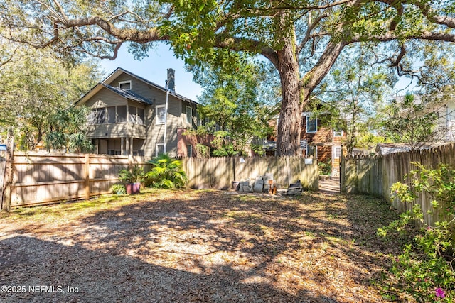 view of yard with fence