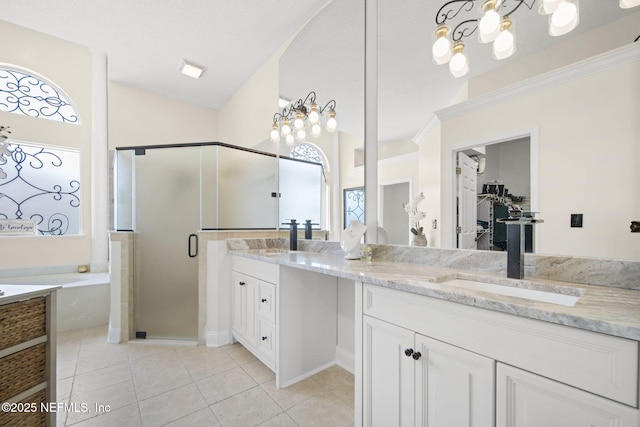 full bath featuring lofted ceiling, tile patterned flooring, a sink, a shower stall, and double vanity