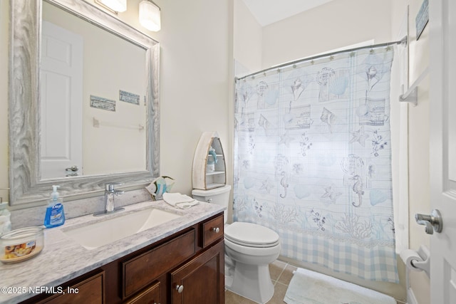 bathroom with toilet, a shower with curtain, tile patterned floors, and vanity