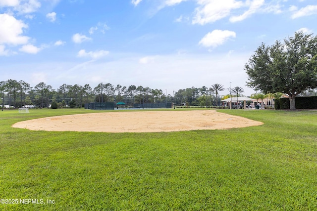 view of community featuring a yard and volleyball court