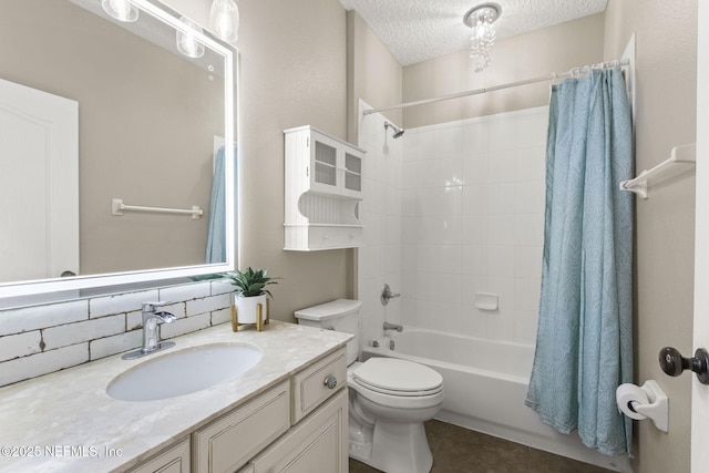 full bath with vanity, shower / bath combo, a textured ceiling, tile patterned floors, and toilet