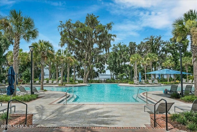 community pool with a patio