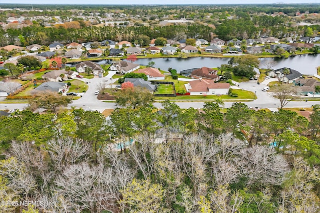 aerial view featuring a residential view and a water view