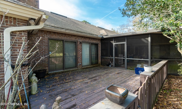 wooden terrace with a sunroom