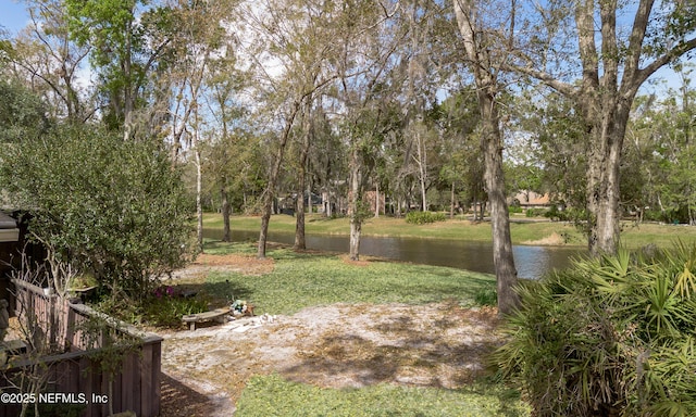 view of yard with a water view