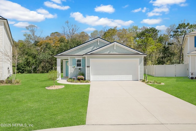 ranch-style house with an attached garage, concrete driveway, a front yard, and fence