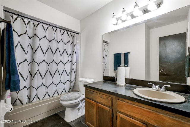 bathroom with vanity, toilet, and shower / bathtub combination with curtain