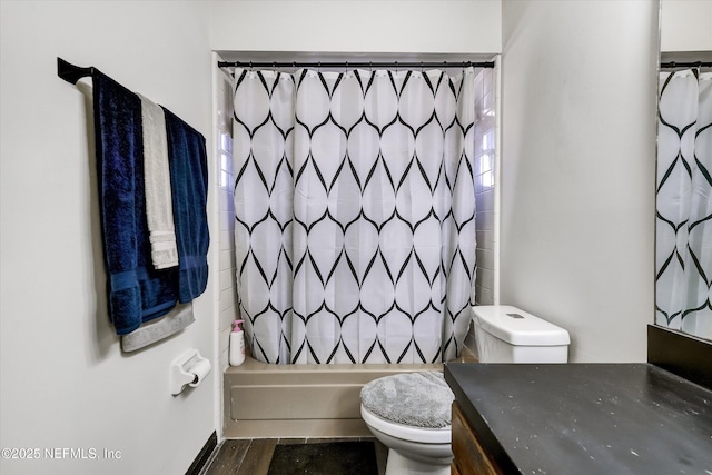 bathroom featuring shower / bathtub combination with curtain, toilet, wood finished floors, and vanity