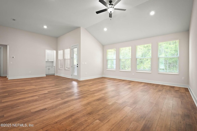 unfurnished living room with recessed lighting, ceiling fan, baseboards, and wood finished floors