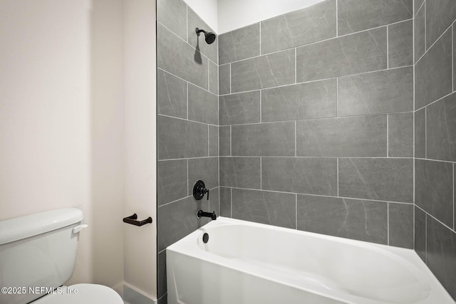 full bathroom featuring shower / bathing tub combination and toilet