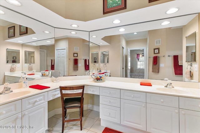 bathroom featuring tile patterned flooring, vanity, and recessed lighting